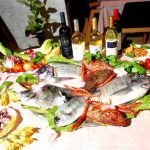 Olio d'oliva extravergine e pesce, nemici della pancreatite acuta
