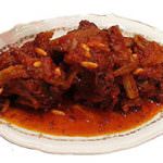 Polenta e coda alla vaccinara per la pace tra Alemanno e Bossi